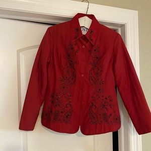 Silk jacket with beaded detail.